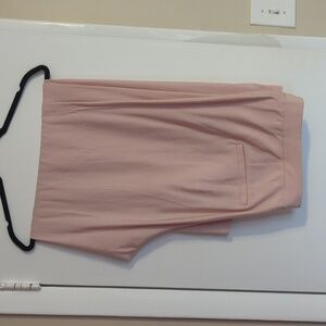 Pink pleated trousers